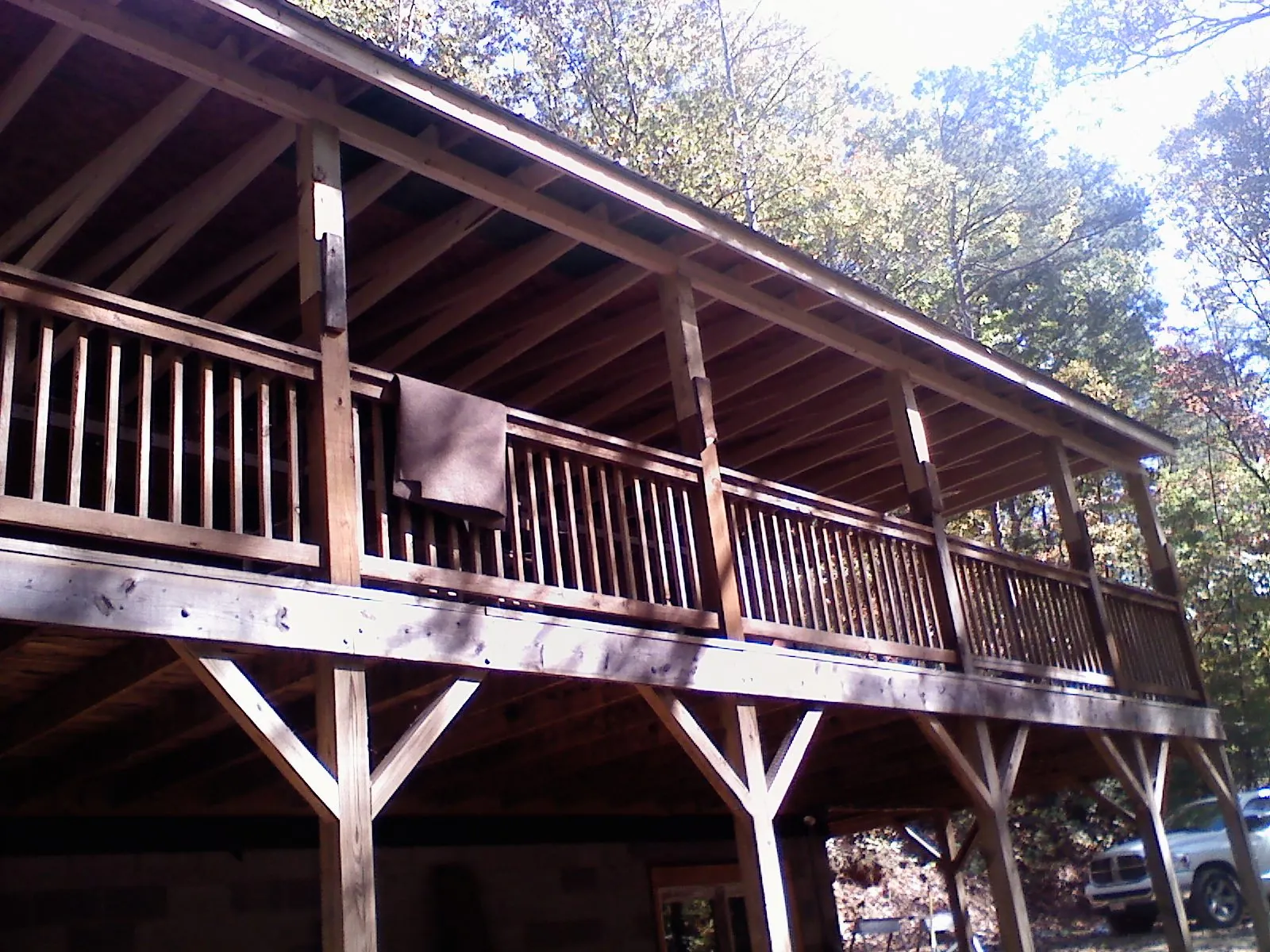 Timber framing under a new elevated porch and deck — Roof Leak Repair in Manteo by Roofing Brothers